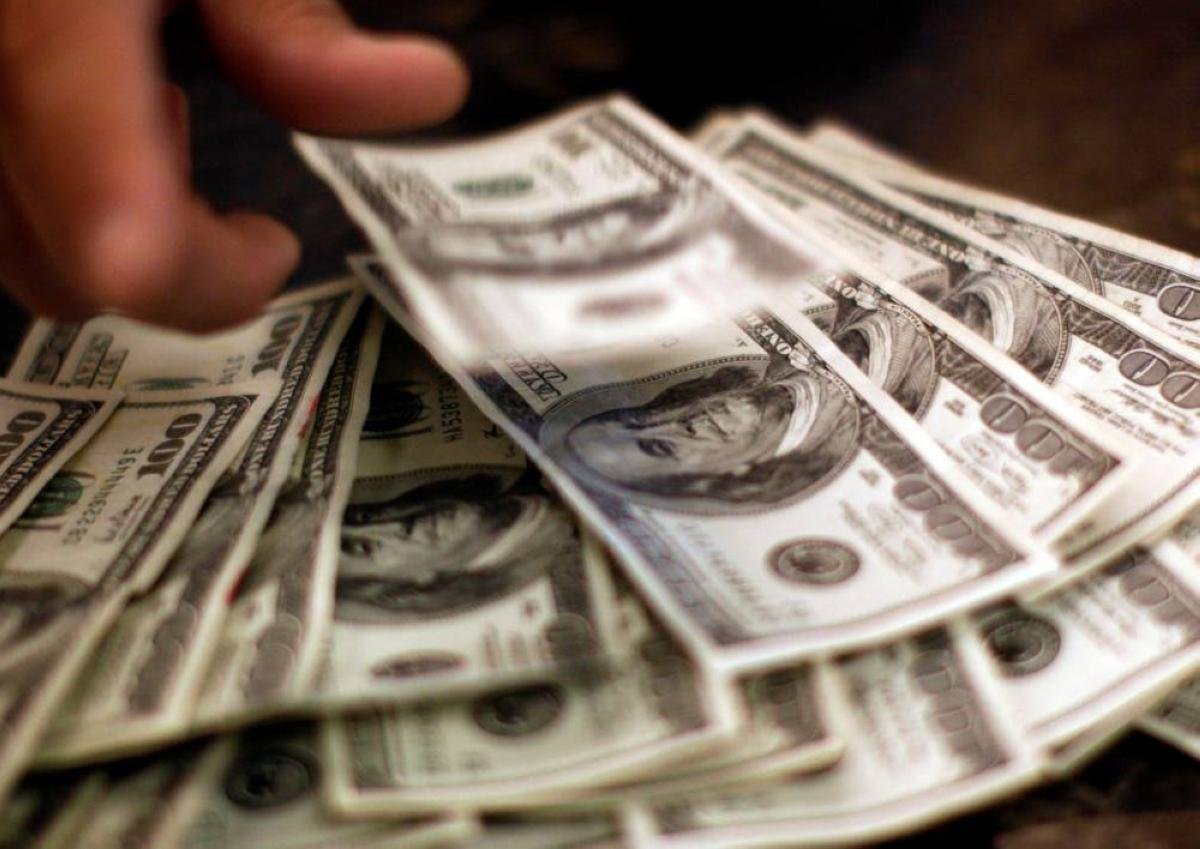 Dollar falls on surprise drop...