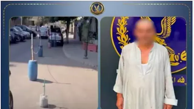 ضبط حارس عقار وضع حواجز بالطري...