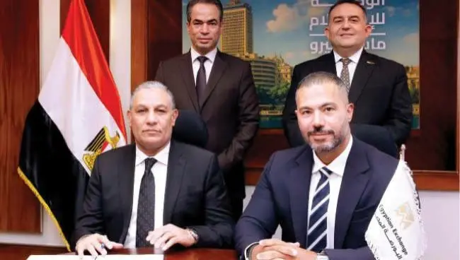 تعاون بين البورصة و«الوطنية للإعلام» لنشر الوعي المالي وتوسيع التغطية المتخصصة