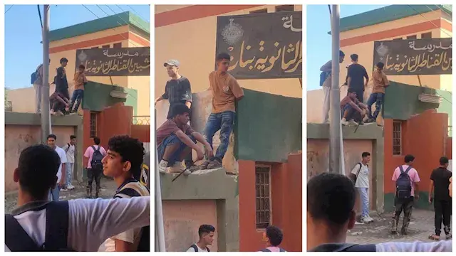 طلاب أعلى سور مدرسة بنات بشبين القناطر.. والأمن يتدخل بعد غضب الأهالي