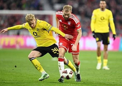 تعادل مثير يحسم قمة بايرن ميونخ وبوروسيا دورتموند في الدوري الألماني