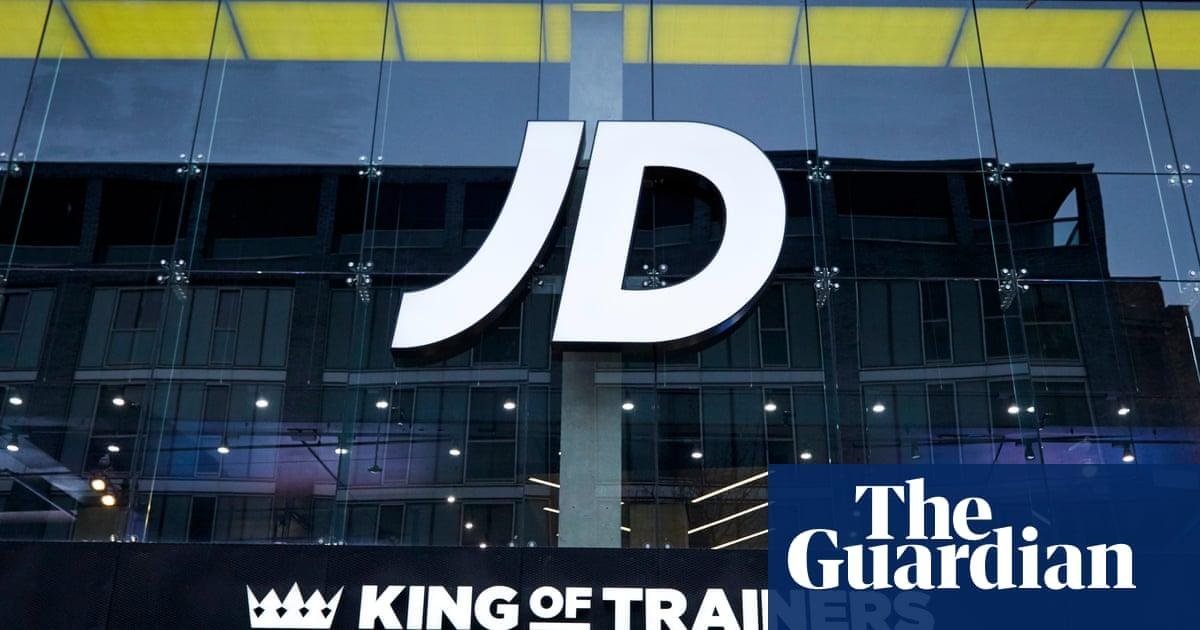 JD Sports cuts £50m from profi...